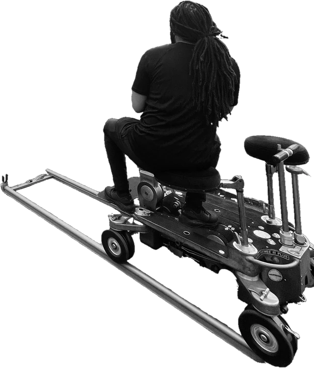 Jabriel operating on a dolly and track